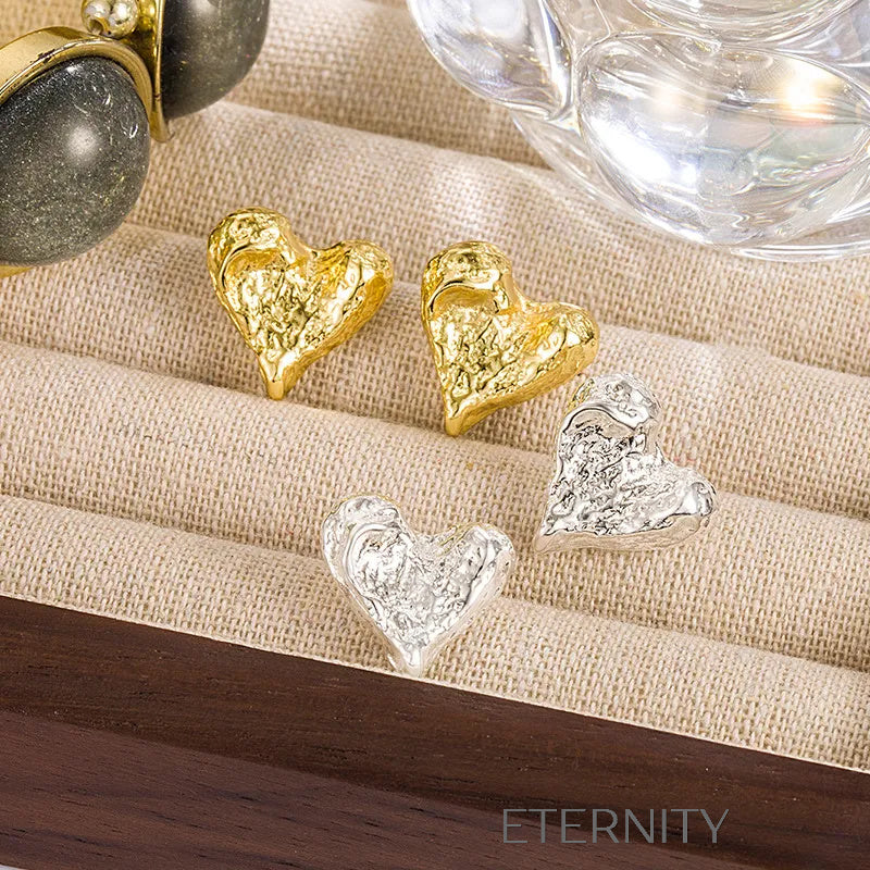 Zarcillos de Corazón con Textura Martelada Eternal Molten  Zarcillos Dorado Unica Acero Inoxidable  ETERNITY