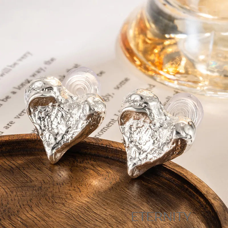 Zarcillos de Corazón con Textura Martelada Eternal Molten  Zarcillos Dorado Unica Acero Inoxidable  ETERNITY