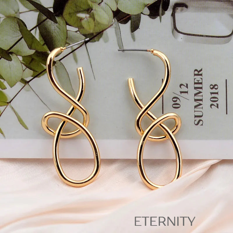 Aretes dorados y plateados con diseño abstracto entrelazado Zarcillos Dorado Unica Acero Inoxidable  ETERNITY