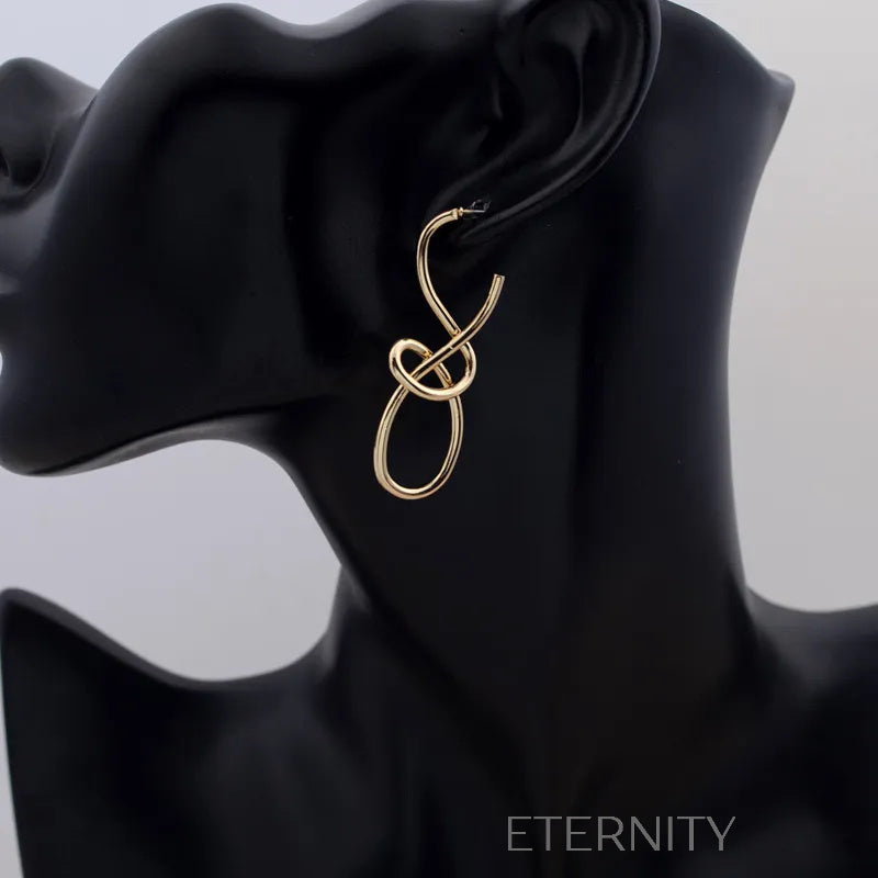 Aretes dorados y plateados con diseño abstracto entrelazado Zarcillos Dorado Unica Acero Inoxidable  ETERNITY