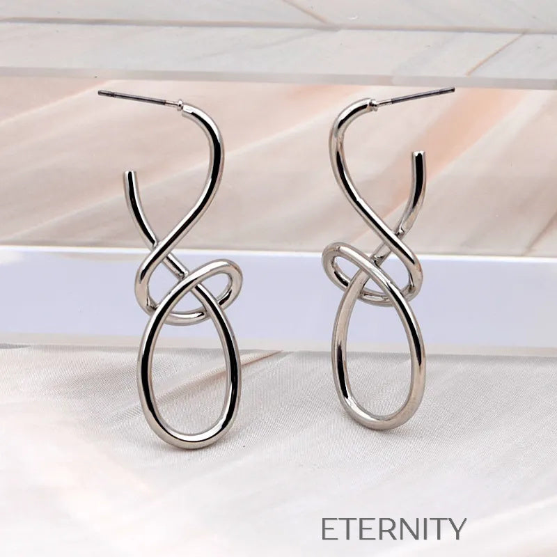 Aretes dorados y plateados con diseño abstracto entrelazado Zarcillos Dorado Unica Acero Inoxidable  ETERNITY