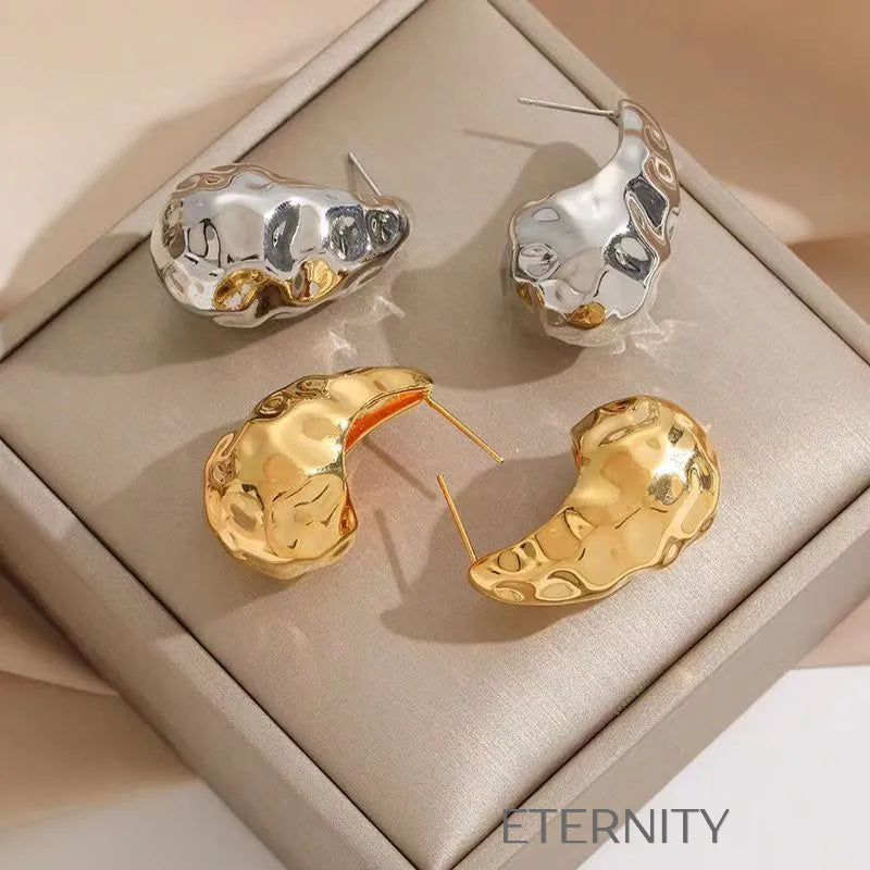 Zarcillos Liquid Metal Diseño Orgánico  Zarcillos Dorado Unica Acero Inoxidable  ETERNITY