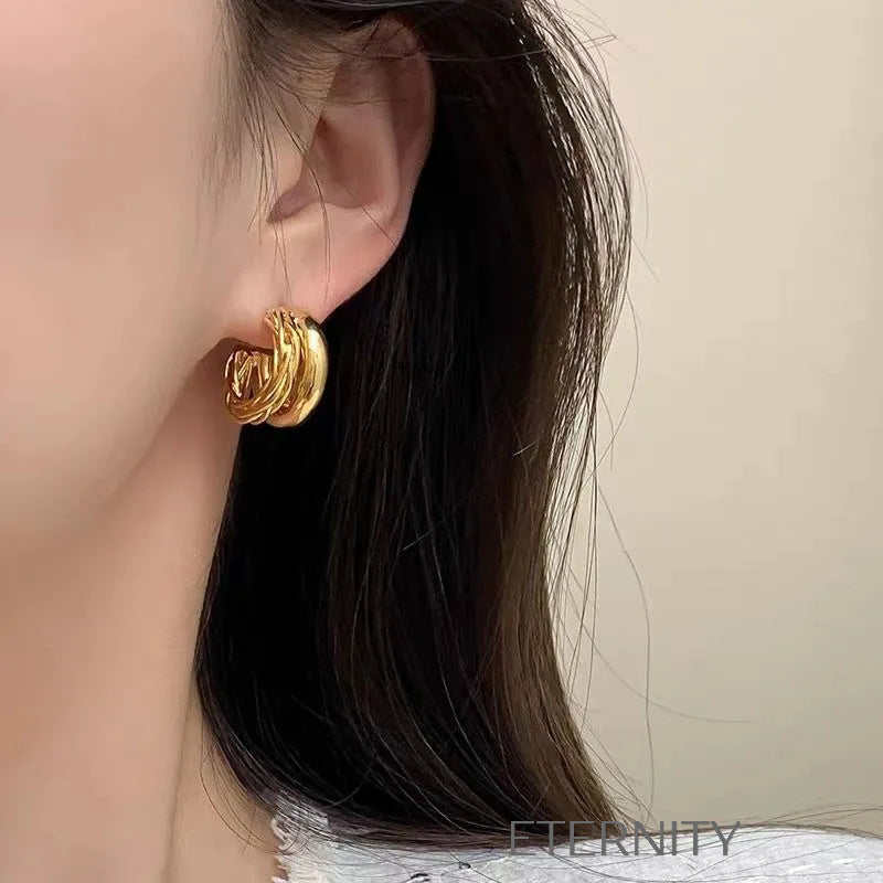 Zarcillos de Argollas Gruesas con Diseño Trenzado  Zarcillos Dorado Unica Acero Inoxidable  ETERNITY