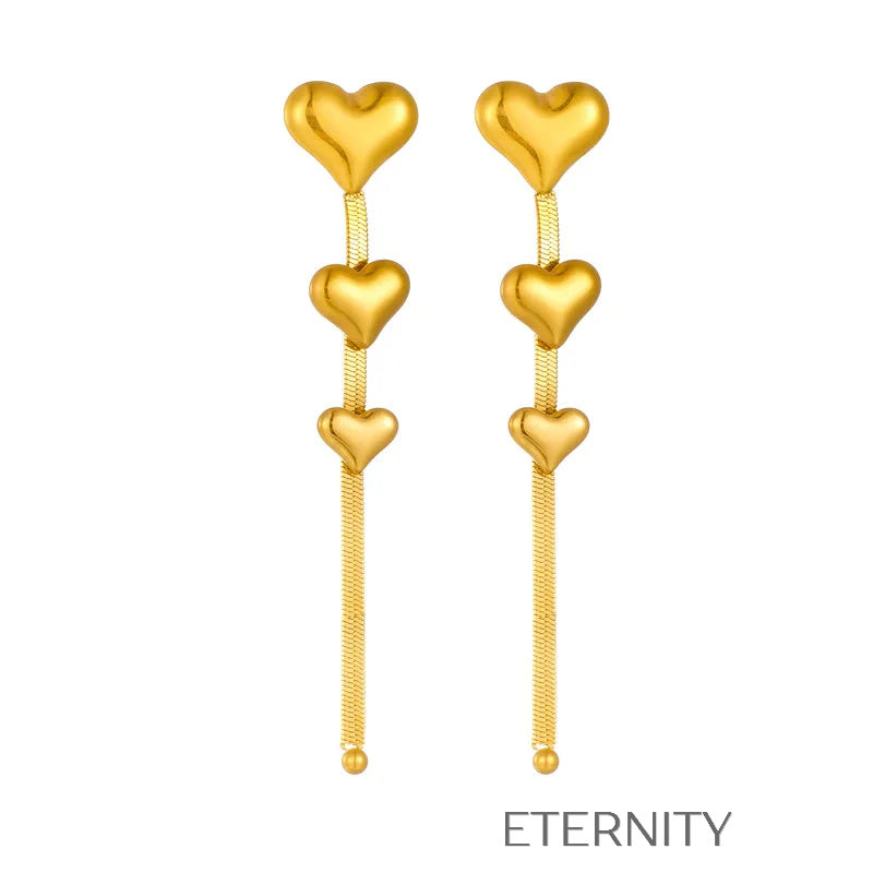 Zarcillos Largos Luminous Heart con Cascada de Corazones y Cadena Plana  Zarcillos Dorado Unica Acero Inoxidable  ETERNITY