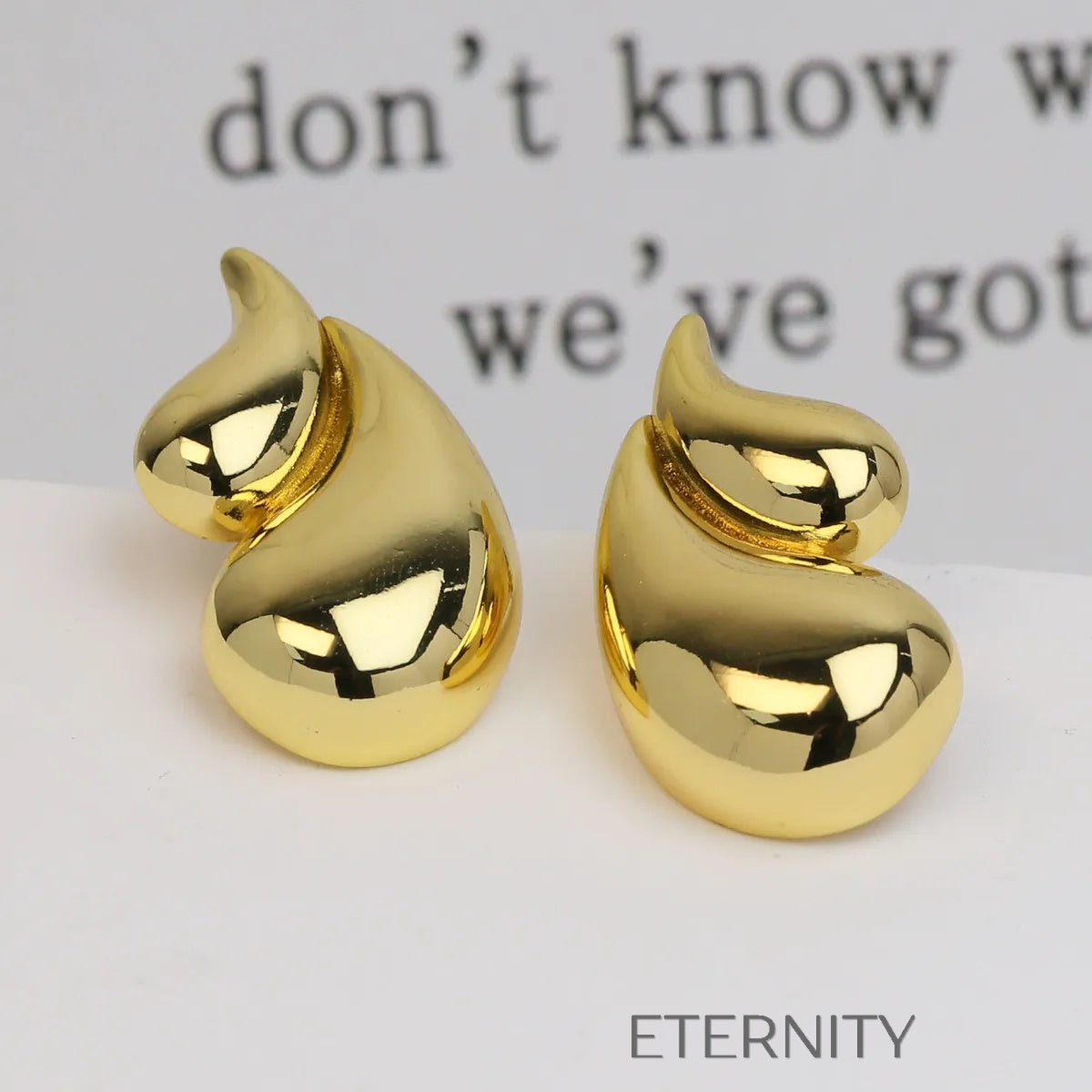 Zarcillos de Aro Infinite Nest con Diseño de Hilos Entrelazados  Zarcillos Dorado Unica Acero Inoxidable  ETERNITY