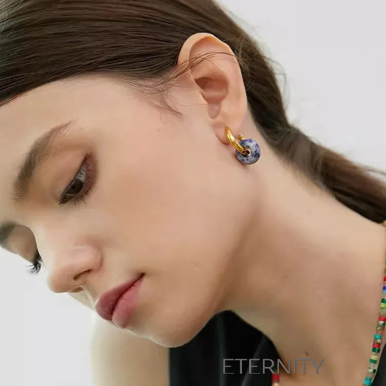 Zarcillos Midnight Orb Aros y Onix  Zarcillos Dorado Unica Acero Inoxidable  ETERNITY