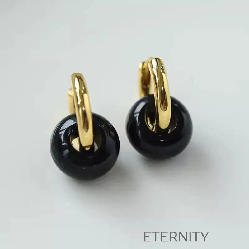 Zarcillos Midnight Orb Aros y Onix  Zarcillos Dorado Unica Acero Inoxidable  ETERNITY