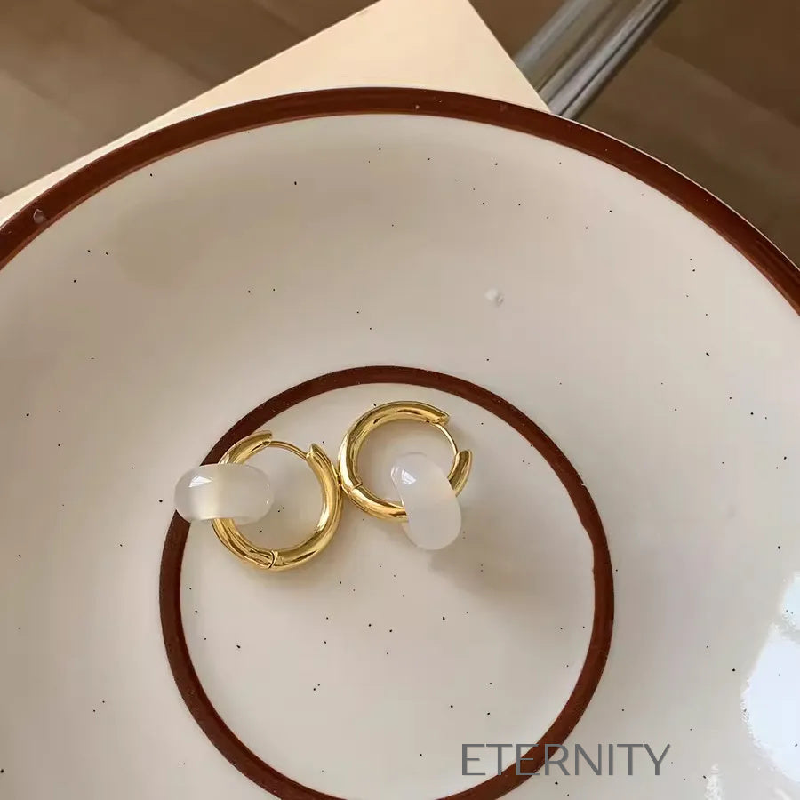 Zarcillos Midnight Orb Aros y Onix  Zarcillos Dorado Unica Acero Inoxidable  ETERNITY