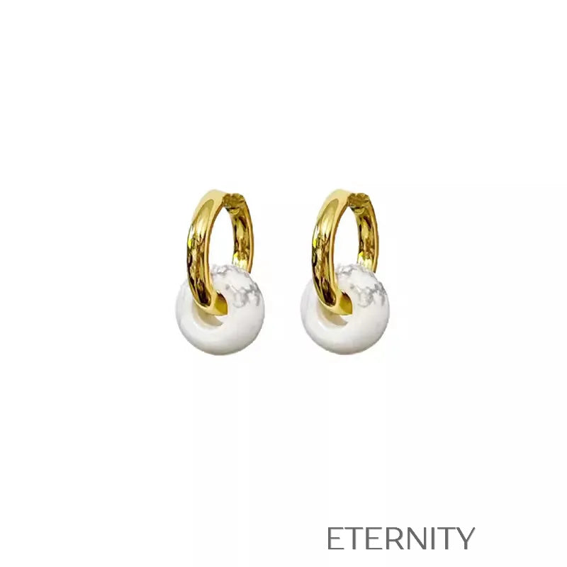Zarcillos Midnight Orb Aros y Onix  Zarcillos Dorado Unica Acero Inoxidable  ETERNITY
