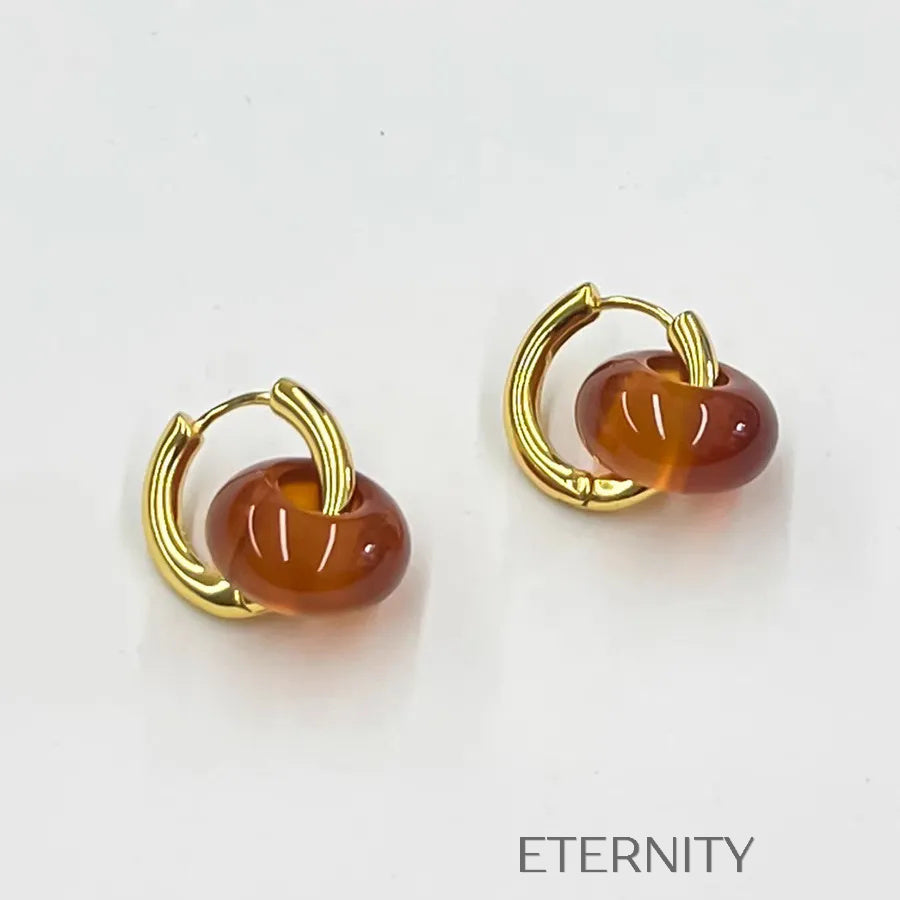 Zarcillos Midnight Orb Aros y Onix  Zarcillos Dorado Unica Acero Inoxidable  ETERNITY
