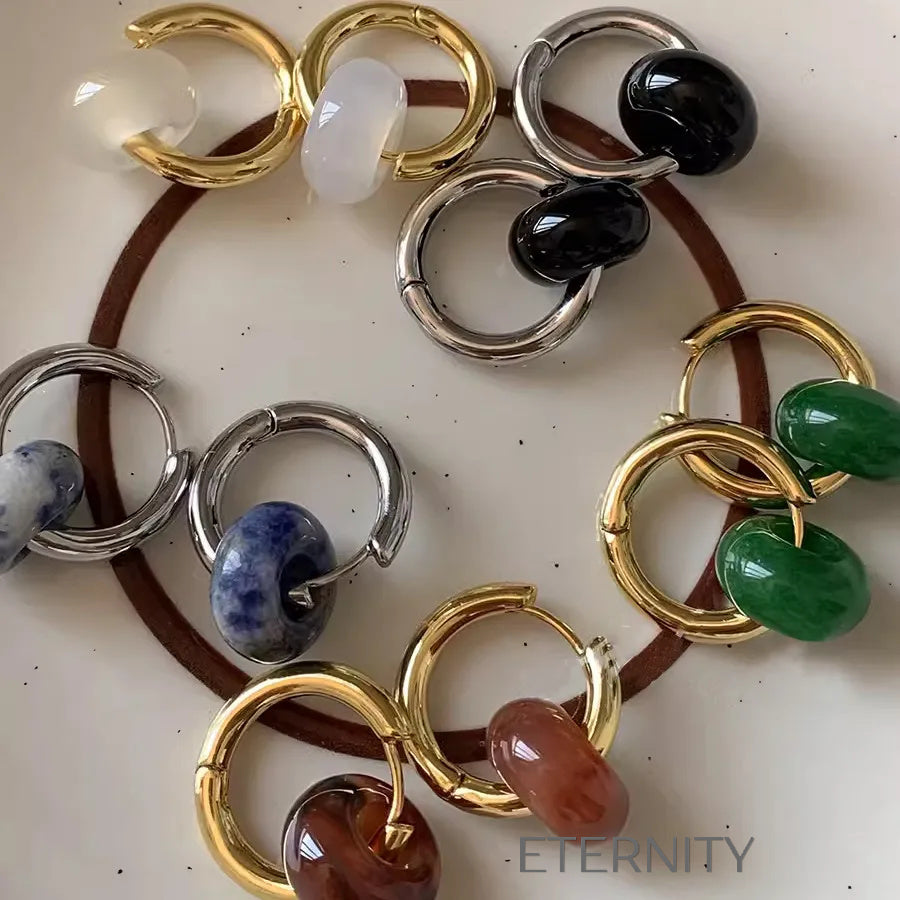 Zarcillos Midnight Orb Aros y Onix  Zarcillos Dorado Unica Acero Inoxidable  ETERNITY