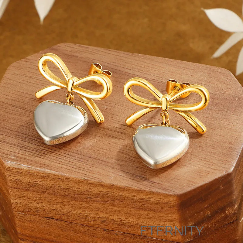 Zarcillos Coquette Heart de Lazo y Corazón  Zarcillos Dorado Unica Acero Inoxidable  ETERNITY