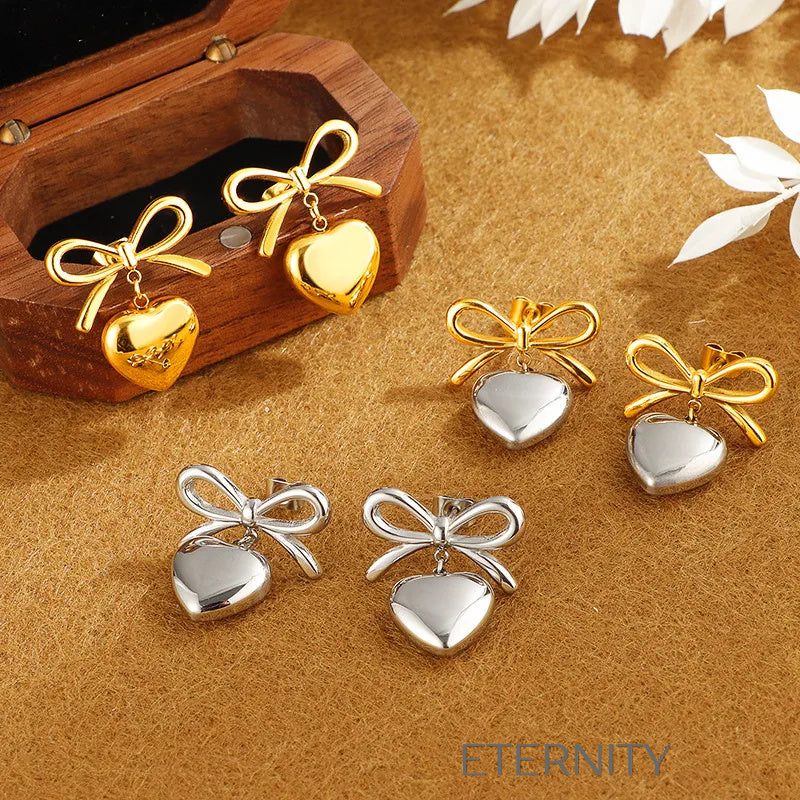 Zarcillos Coquette Heart de Lazo y Corazón  Zarcillos Dorado Unica Acero Inoxidable  ETERNITY