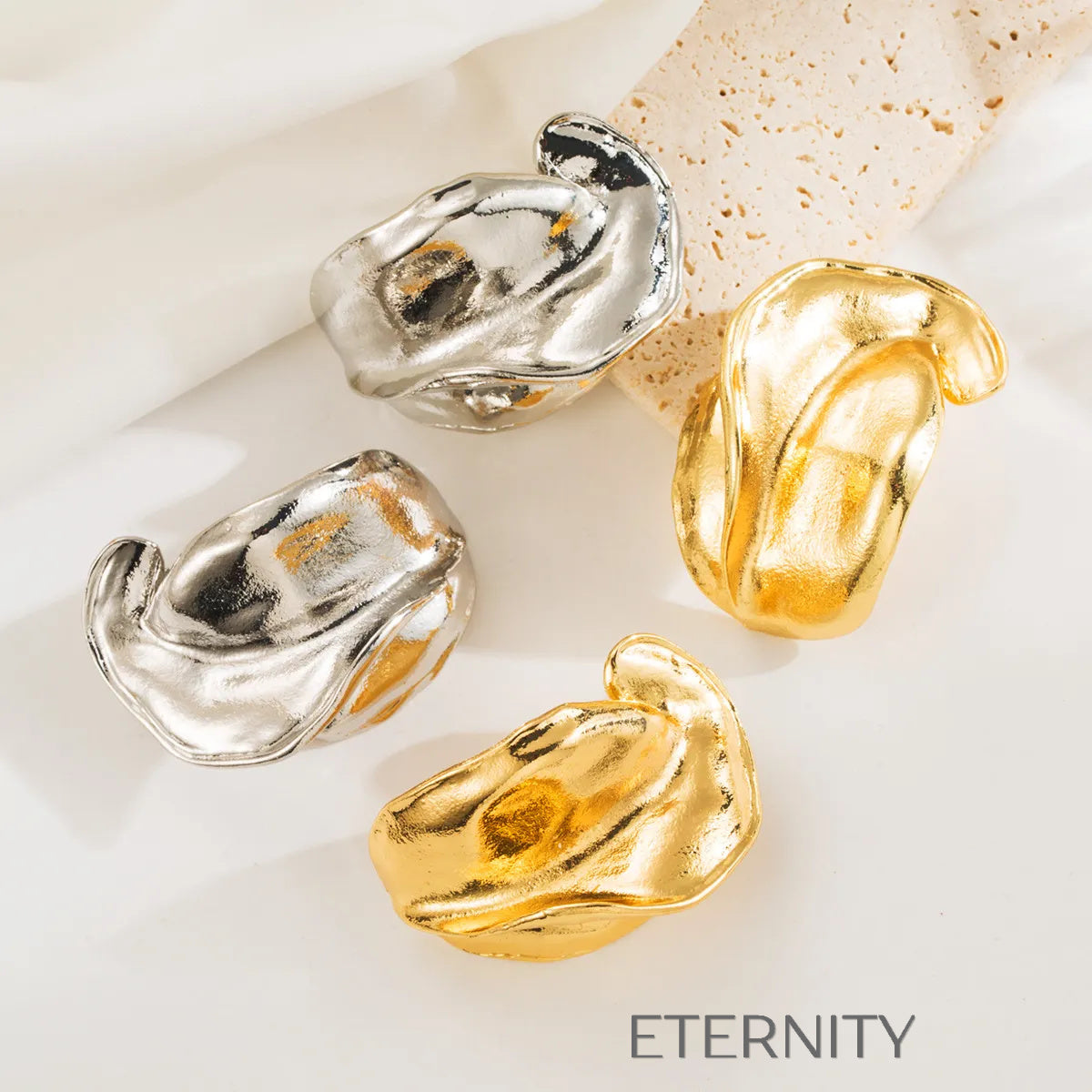 Zarcillos Liquid Fold  Zarcillos Dorado Unica Acero Inoxidable  ETERNITY