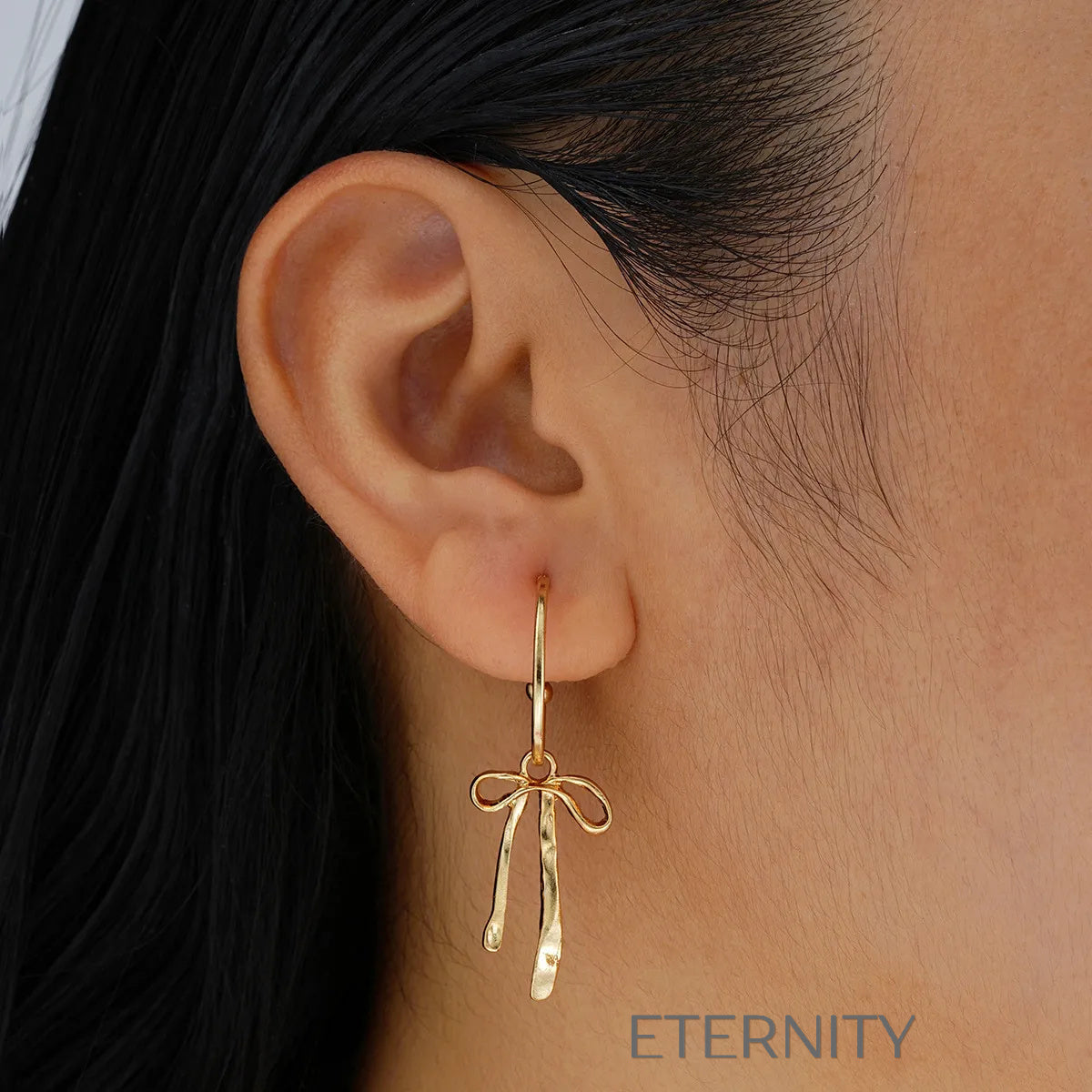Aretes con lazo y colgantes texturizados Zarcillos Dorado Unica Acero Inoxidable  ETERNITY