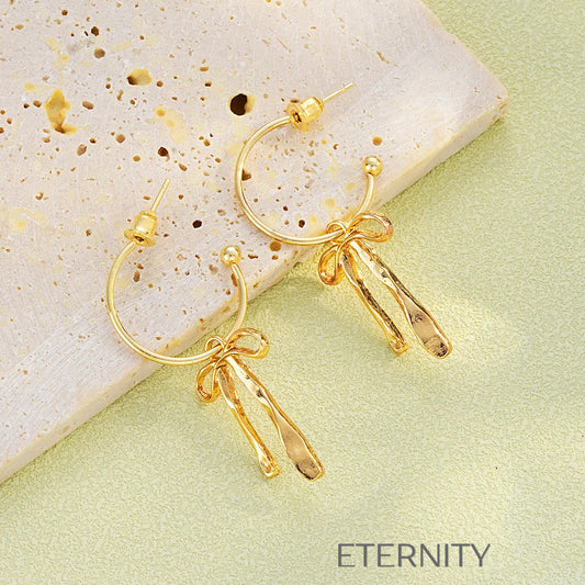 Aretes con lazo y colgantes texturizados Zarcillos Dorado Unica Acero Inoxidable  ETERNITY