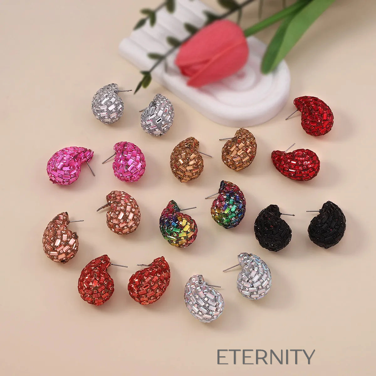 Zarcillos Rainbow Crystal en Forma de Gota con Micro Pavé de Colores  Zarcillos Negro Unica Acero Inoxidable  ETERNITY