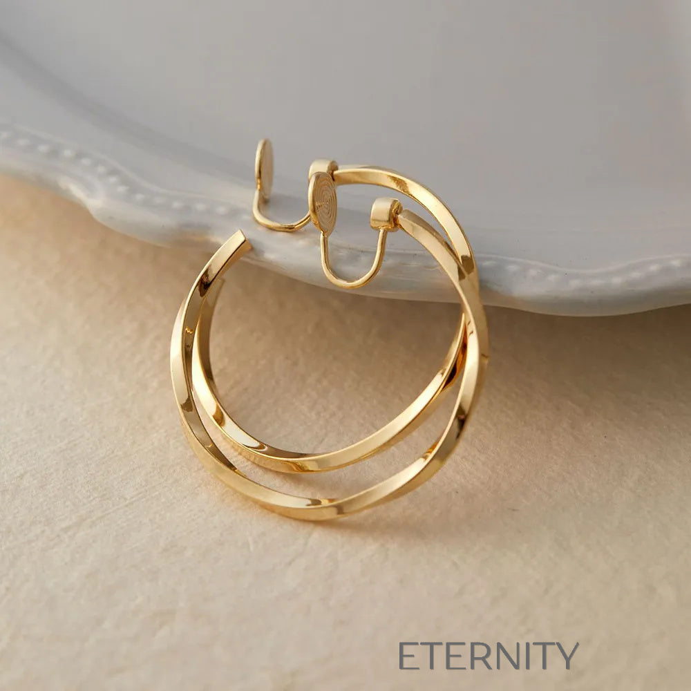 Aretes dorados y plateados con diseño moderno y elegante Zarcillos Dorado 40mm Acero Inoxidable  ETERNITY