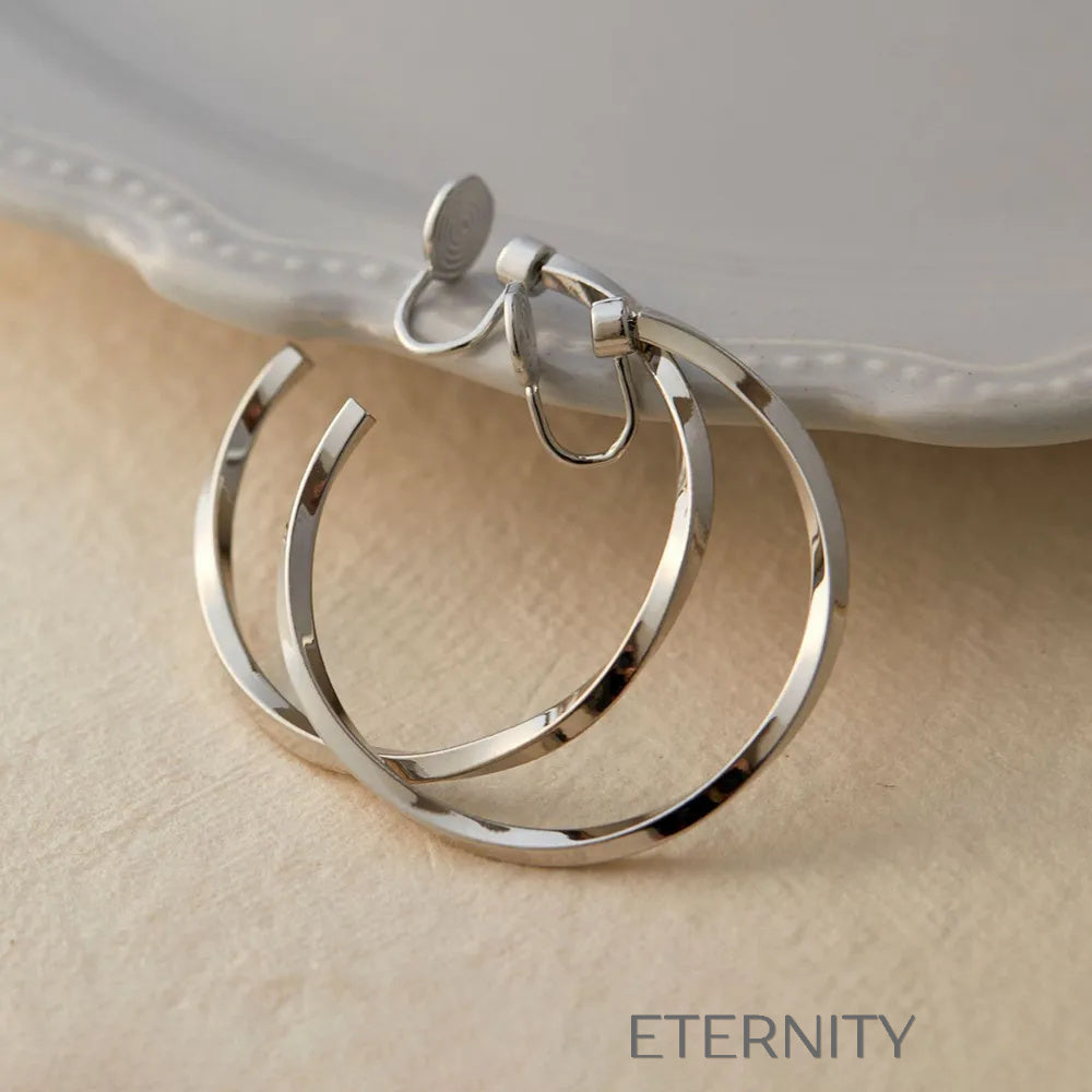 Aretes dorados y plateados con diseño moderno y elegante Zarcillos Dorado 40mm Acero Inoxidable  ETERNITY