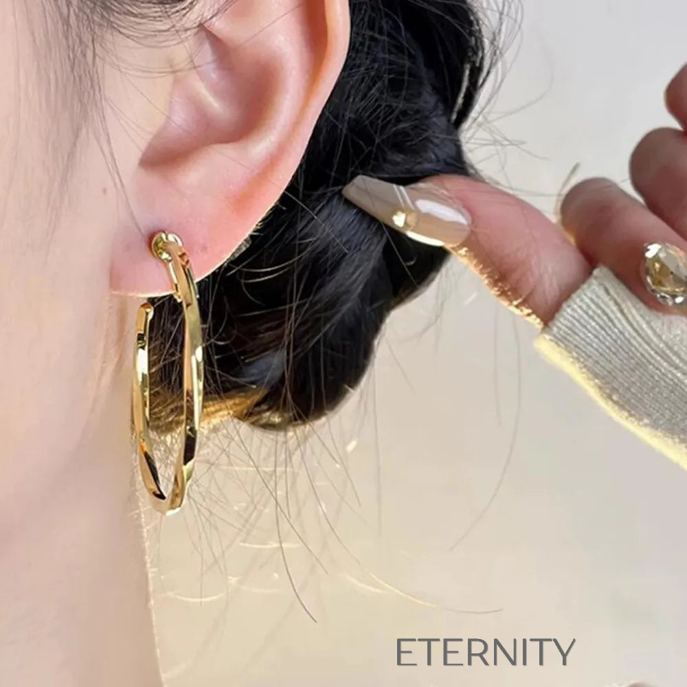 Aretes dorados y plateados con diseño moderno y elegante Zarcillos Dorado 40mm Acero Inoxidable  ETERNITY