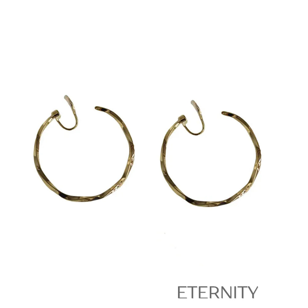 Aretes dorados y plateados con diseño moderno y elegante Zarcillos Dorado 40mm Acero Inoxidable  ETERNITY