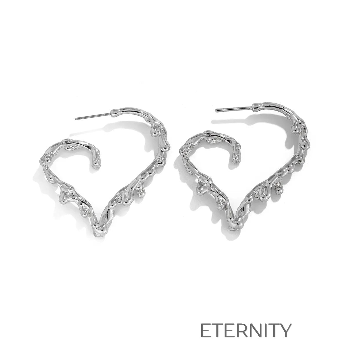 Aretes dorados y plateados con diseño artístico y moderno Zarcillos Dorado Unica Acero Inoxidable  ETERNITY