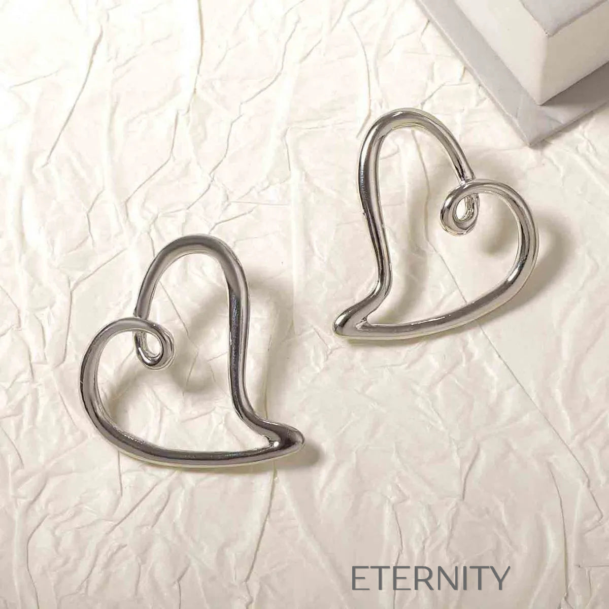 Zarcillo Liquid Heart Estilizado  Zarcillos Dorado Unica Acero Inoxidable  ETERNITY
