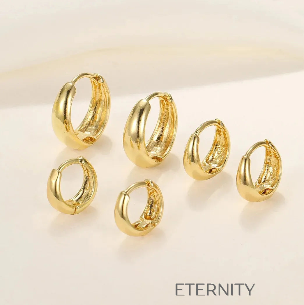 Zarcillos de Aro Sol Radiante con Rayos Irregulares  Zarcillos Dorado Unica Acero Inoxidable  ETERNITY