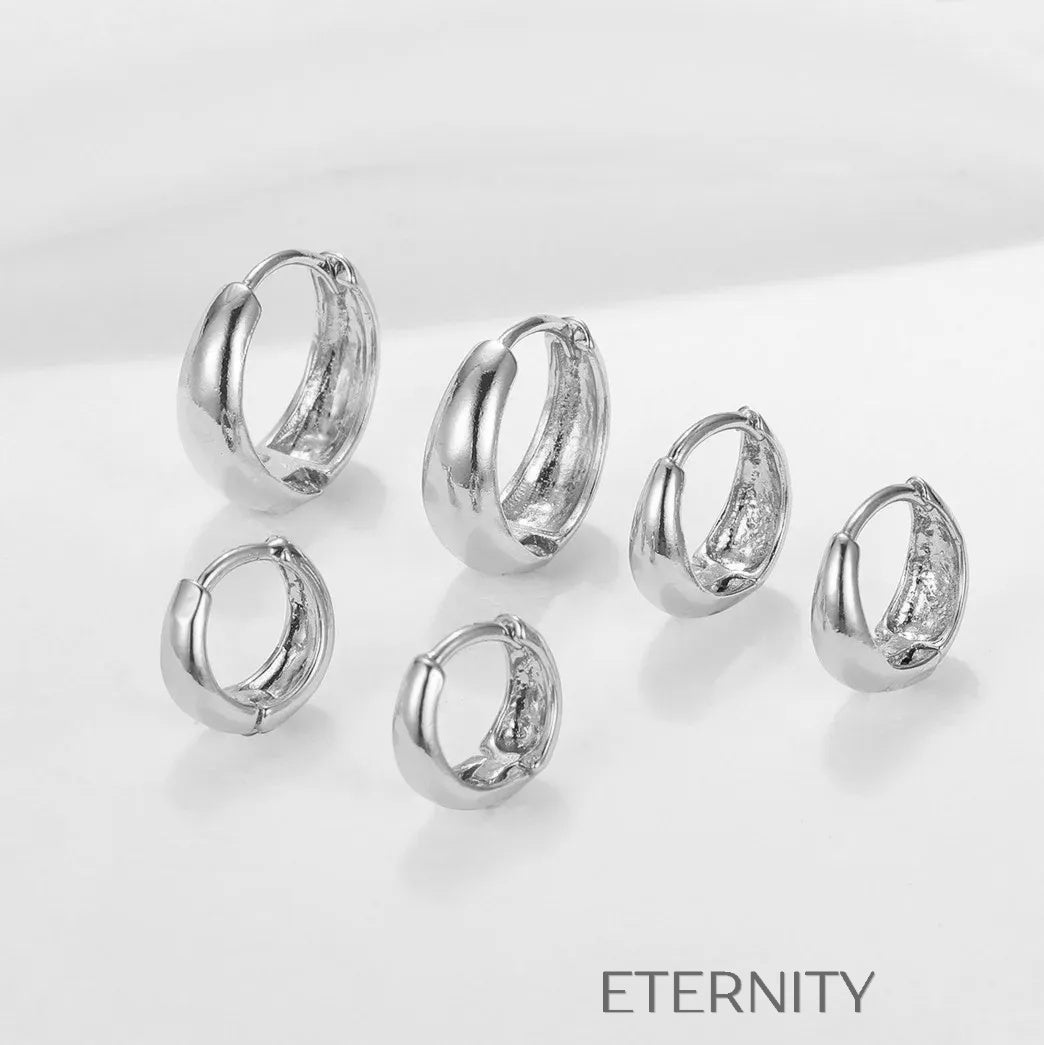 Zarcillos de Aro Sol Radiante con Rayos Irregulares  Zarcillos Dorado Unica Acero Inoxidable  ETERNITY