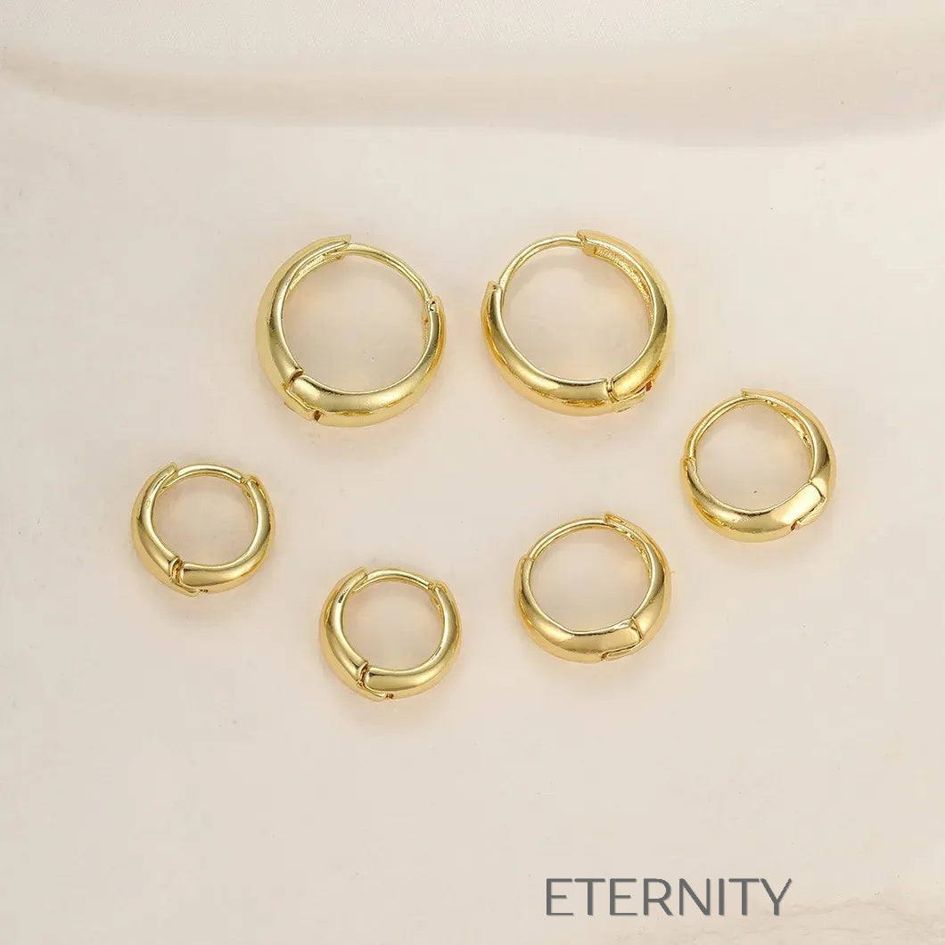 Zarcillos de Aro Sol Radiante con Rayos Irregulares  Zarcillos Dorado Unica Acero Inoxidable  ETERNITY