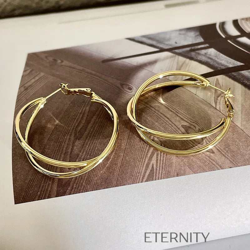 Zarcillos Intertwined Luna  Zarcillos Dorado Unica Acero Inoxidable  ETERNITY