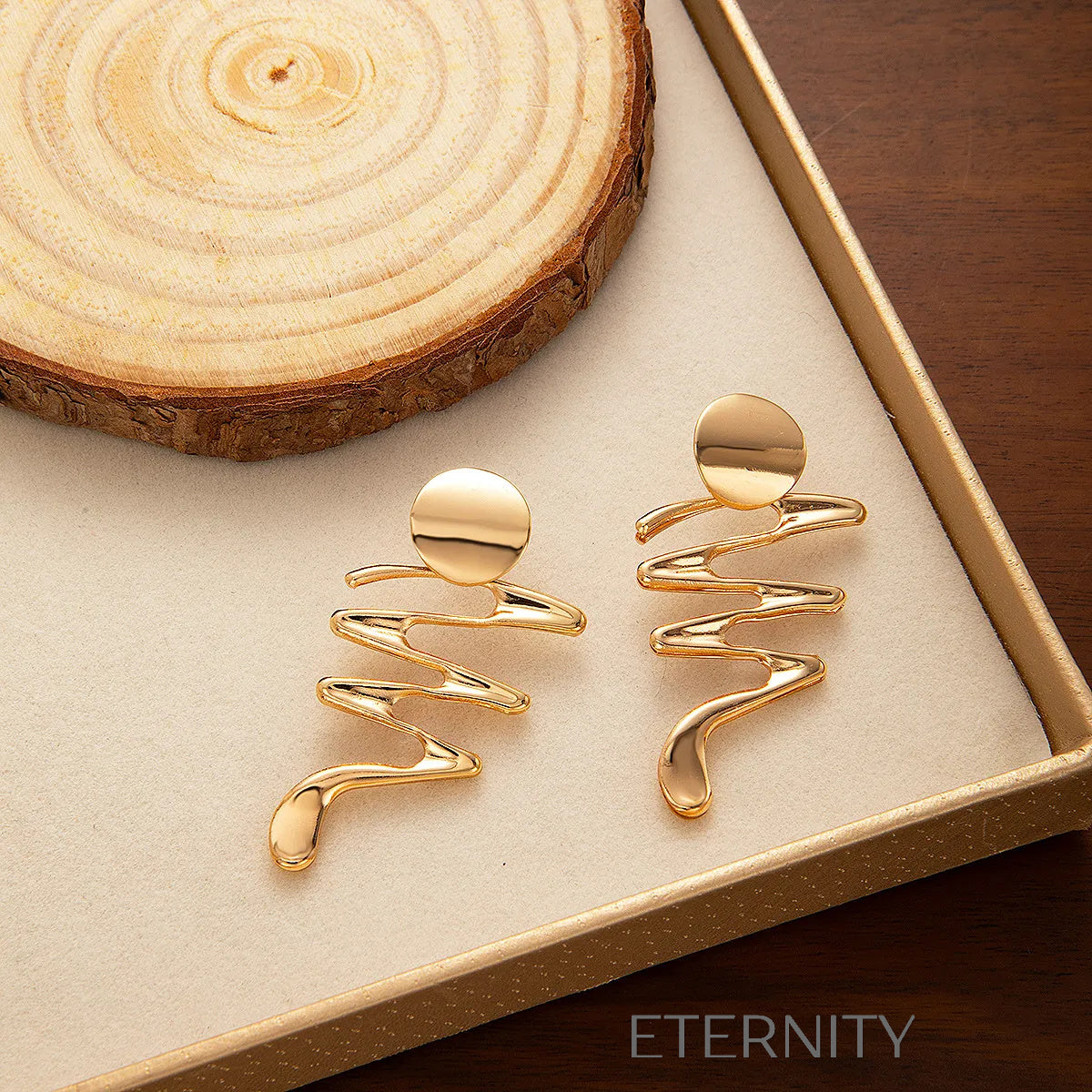 Zarcillos Abstract Wave de Diseño Escultural en Oro y Plata  Zarcillos Plateado Unica Acero Inoxidable  ETERNITY