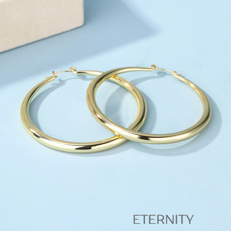 Argollas Infinite Shine de Gran Formato  Zarcillos Dorado Unica Acero Inoxidable  ETERNITY