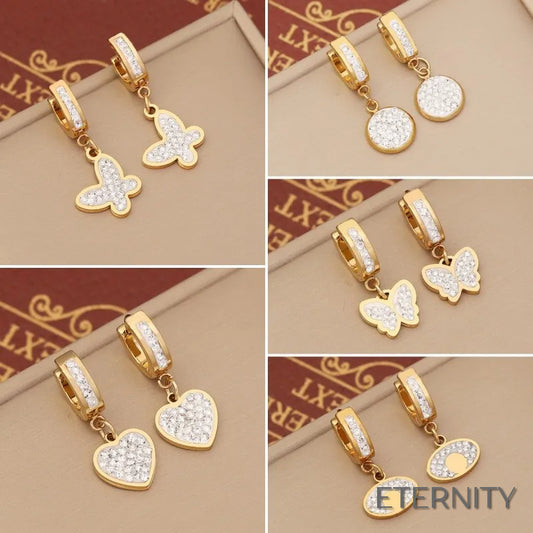 Zarcillos Colgantes Dorados con Dijes Brillantes de Mariposa, Corazón y Círculo - ETERNITY