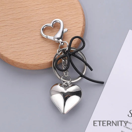 Llaveros Femeninos de Moda con Corazón Brillante y Lazo Minimalista - ETERNITY