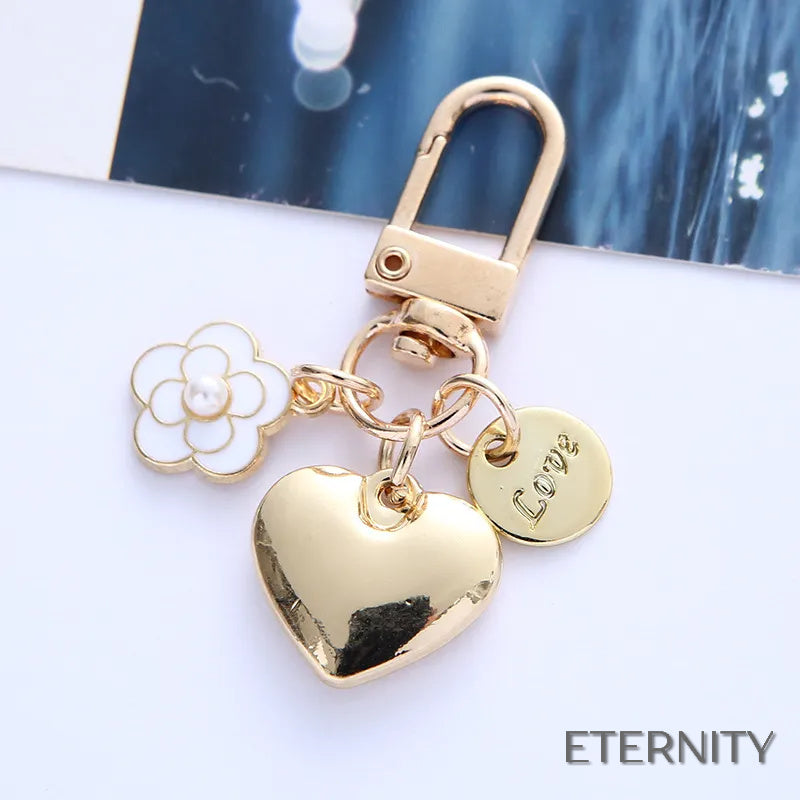 Adorables Llaveros Femeninos con Corazón Liso, Flor con Perla y Mensaje de Amor - ETERNITY