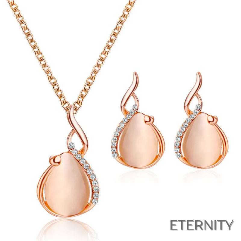Elegante Conjunto Femenino con Ópalos Claros y Detalles Brillantes - ETERNITY