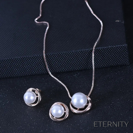 Set Moderno: Collar y Pendientes con Perla en Diseño Circular - ETERNITY