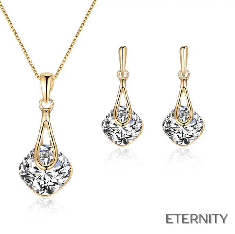Set de Collar y Zarcillos Dorados con Cristal Facetado Cuadrado - ETERNITY