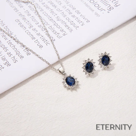 Set de Collar y Pendientes Plateados con Zafiro Tanzanita Ovalado y Halo de Rhinestones - ETERNITY