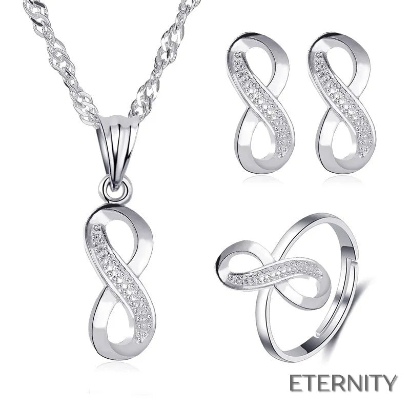 Conjunto Femenino de Collar Zarcillos y Anillocon Diseño de Infinito Adornado con Circonitas - ETERNITY