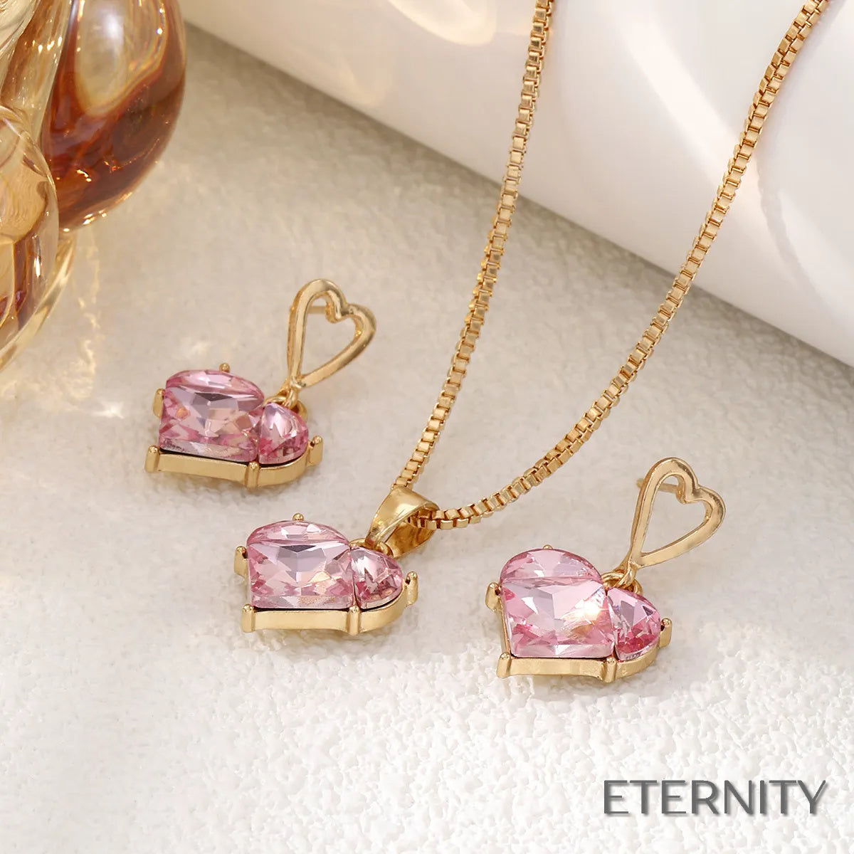 Set Dorado de Cadena y Zarcillos con Corazón de Cristal Rosa Melocotón - ETERNITY
