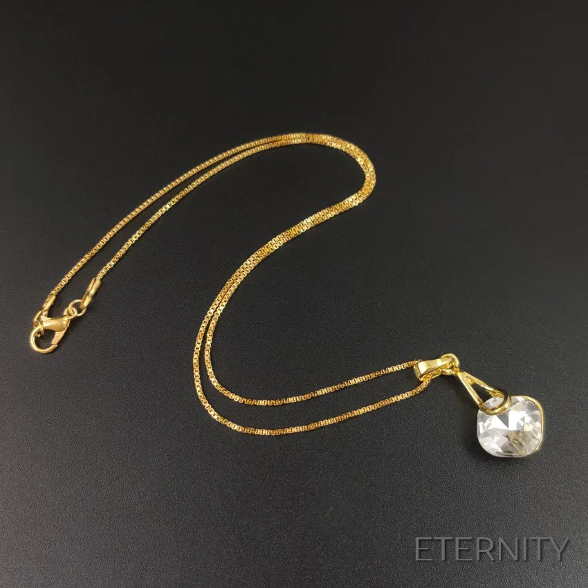 Set de Collar y Zarcillos Dorados con Cristal Facetado Cuadrado - ETERNITY