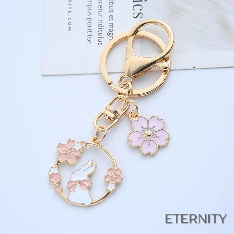 Adorables Llaveros Femeninos con Diseño de Conejito y Flores - ETERNITY