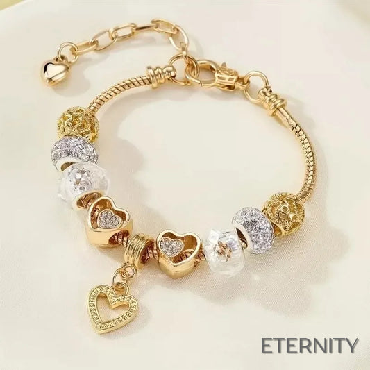Pulsera Ajustable Dorada con Cuentas de Corazón, Caladas y Brillantes - ETERNITY