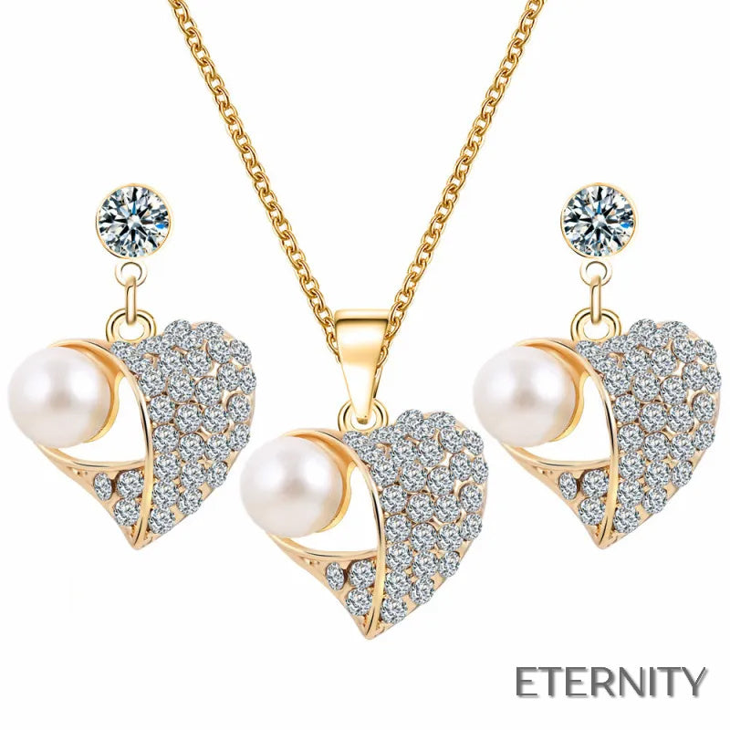 Set Romántico Dorado: Collar y Zarcillos con Forma de Corazón, Perla y Rhinestones