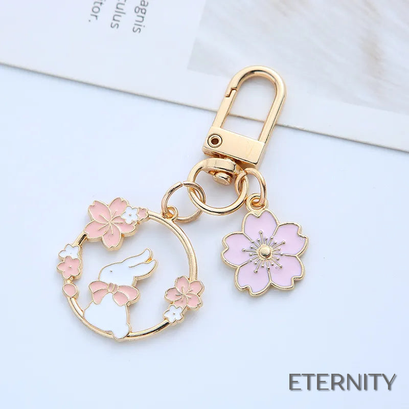Adorables Llaveros Femeninos con Diseño de Conejito y Flores - ETERNITY