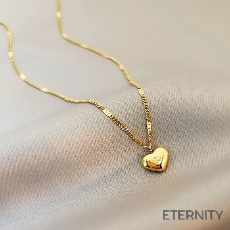 Collar Moderno para Mujer: Cadena Dorada con Colgante de Corazón "Love" - ETERNITY