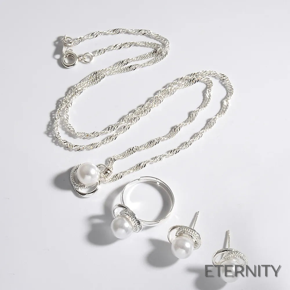 Elegante Conjunto Femenino: Cadena, Anillo y Aretes con Perlas Simuladas y Adornos Luminosos - ETERNITY