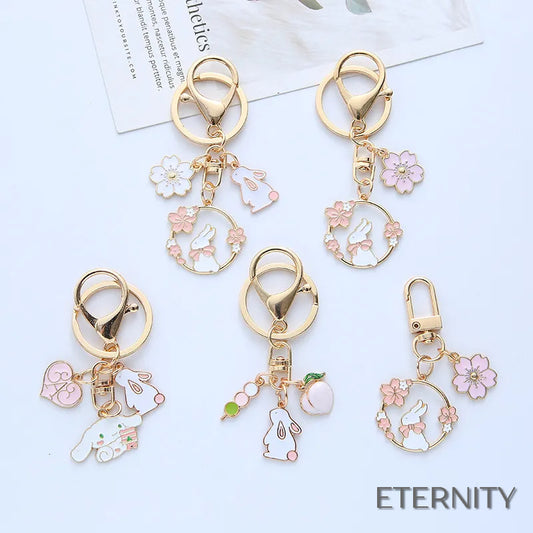 Adorables Llaveros Femeninos con Diseño de Conejito y Flores - ETERNITY